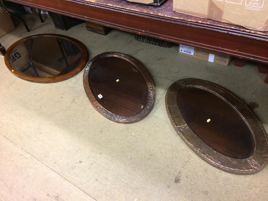 Three oval mirrors