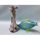 A coloured glass fish and a vase