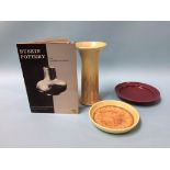 A Ruskin pottery spill vase, two dishes and a book 'Ruskin Pottery' by James H. Rushton