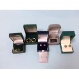 Four pairs of 9ct gold (stamped 375) earrings, weight 10.7g and a pair of 14ct gold earrings