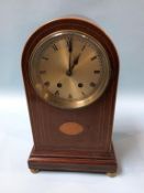 An Edwardian bracket clock with 8 day movement and strike action, 40cm height