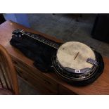 An Elite banjo and soft case