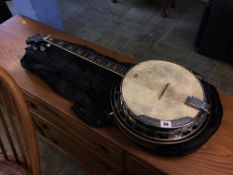 An Elite banjo and soft case