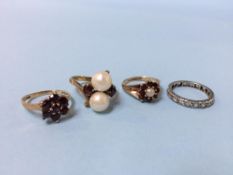 Three 9ct gold dress rings and a full eternity ring, total weight 9.6g