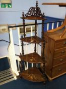 A Victorian walnut and marquetry four tier corner whatnot