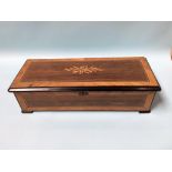 A good Edwardian rosewood and marquetry inlaid Swiss musical box playing 8 airs, 59cm wide