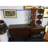 A tea trolley, two cake stands, and an oak gateleg table