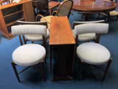 A G Plan teak dining table and four G Plan chairs