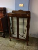 An oak china cabinet