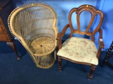 A child's peacock style chair, and a dolls chair