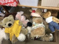 Three boxes of soft toys