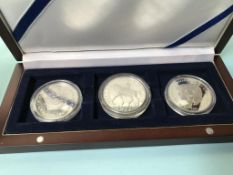 Three UK silver proof coins