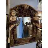 An ornate gilt mirror