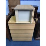 An Ikea chest of drawers and bedside cabinet