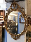 A gilt framed mirror