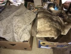 Two boxes of fur coats