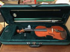 A violin, bow and hard case