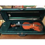 A violin, bow and hard case