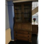 An oak bureau bookcase