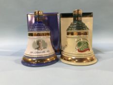 Two commemorative bottles of Bells Whiskey