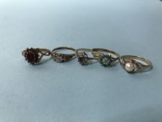 Five 9ct gold rings 7.6g