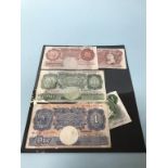 A collection of pre-decimal banknotes