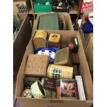 A quantity of tins etc., in two boxes