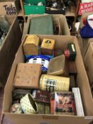 A quantity of tins etc., in two boxes