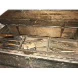 A large wooden tool chest and contents