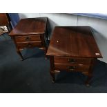A pair of reproduction mahogany side tables