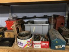 A shelf of assorted, to include an oil bottle and tools etc.