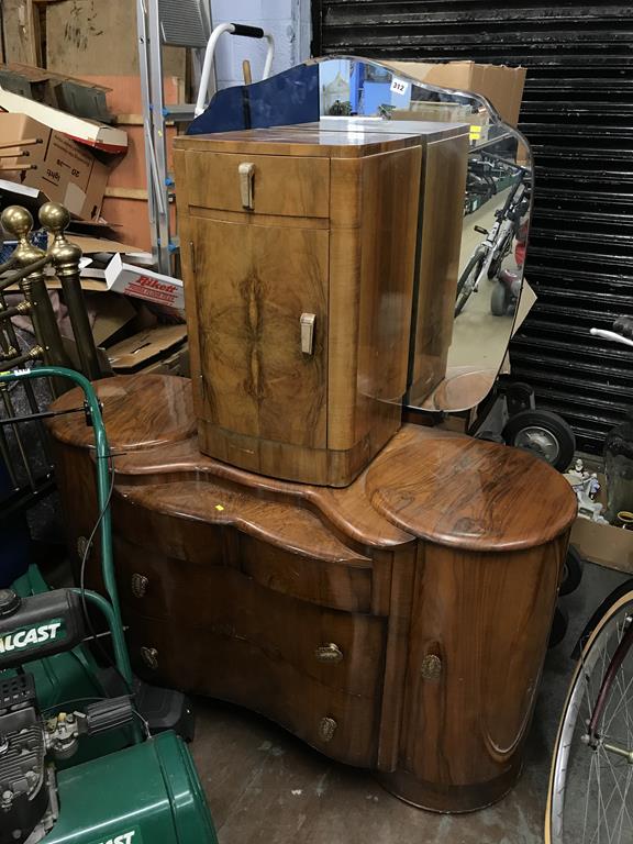 A walnut dressing table and bedside cabinet