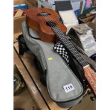Three ukuleles in soft cases