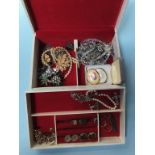 A jewellery box and contents, to include silver brooches, and rings etc.