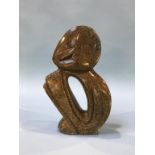 An abstract stone sculpture, signed Zachariah Njobo