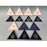 Seven boxed Swarovski Christmas ornaments