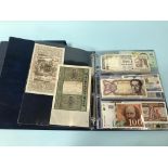An album of approximately 100 world bank notes, some uncirculated