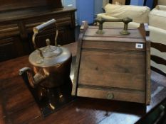 A coal box and a copper kettle