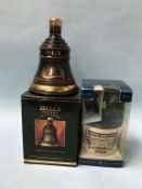 A Bells Whisky 'Christmas 1992' and a bottle of Lambs Navy Rum (2)