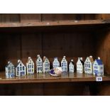 Eleven Delft style Dutch houses (one KLM) and a Royal Crown Derby paperweight