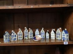 Eleven Delft style Dutch houses (one KLM) and a Royal Crown Derby paperweight