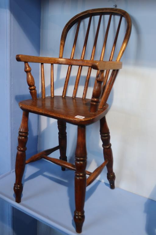 A child's Windsor stick back high chair