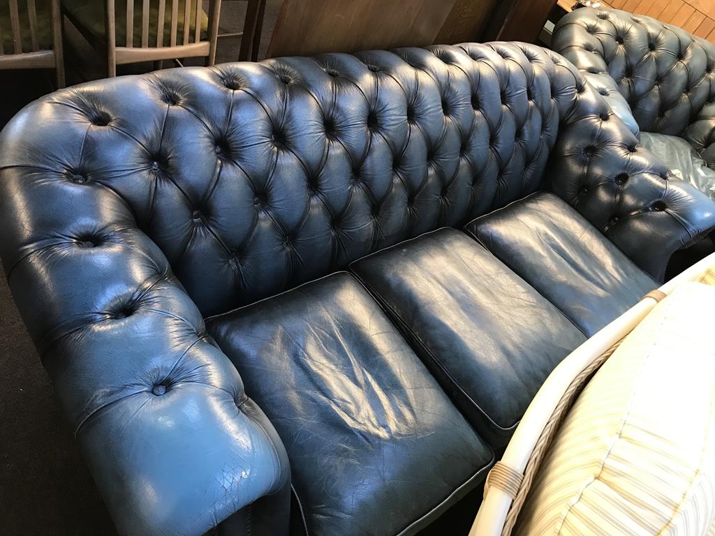 A blue leather Chesterfield three seater settee, a club chair and a high back armchair - Image 2 of 4