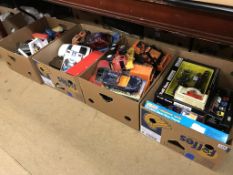 Four boxes of various toys
