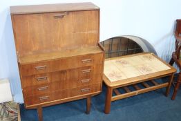 A teak bureau and a teak tiled coffee table