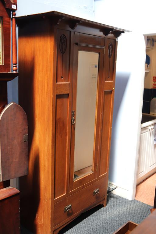 A mahogany Art Nouveau mirror door wardrobe