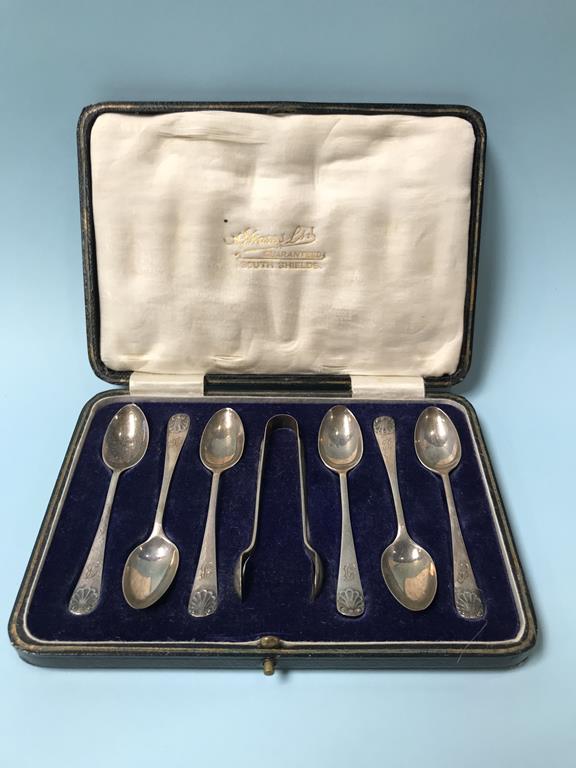 A cased set of silver spoons