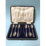 A cased set of silver spoons