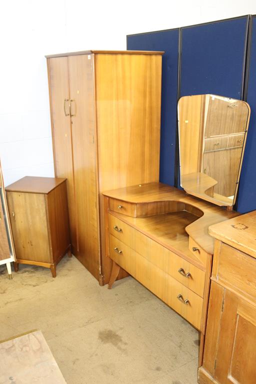 A teak three piece bedroom suite