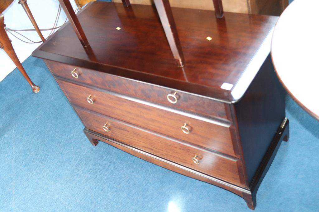 A Stag Minstrel chest of drawers and a stool